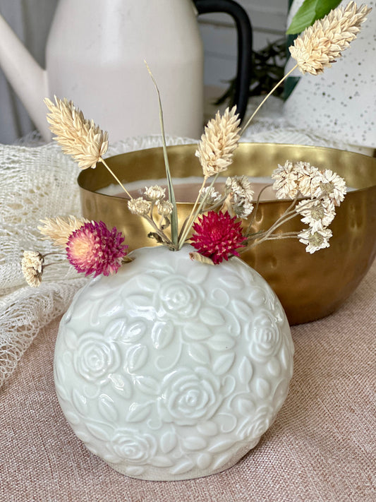 Ceramic vessel with dried flowers